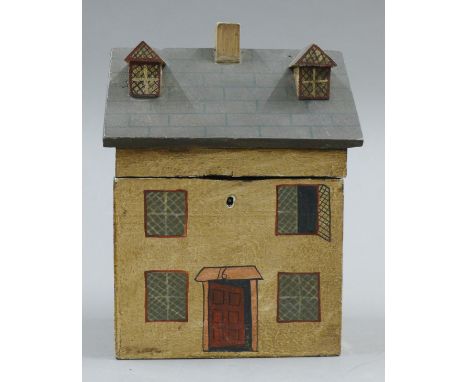 A house formed tea caddy. 
