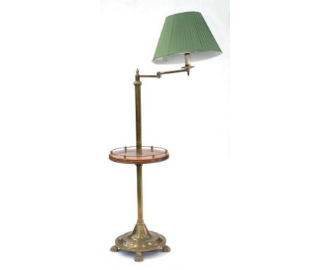 AN EARLY 20TH CENTURY BRASS ADJUSTABLE READING LAMP WITH WALNUT SHELF, 110CM H