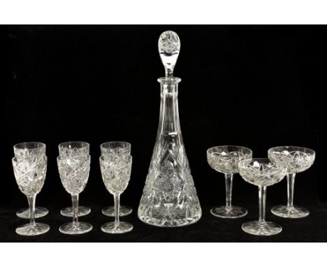 NINE CUT GLASS PORT AND CHAMPAGNE GLASSES AND A DECANTER AND STOPPER EN SUITE, 39CM H