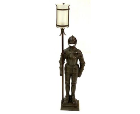 A CAST IRON FIGURAL LAMP IN THE FORM OF A SUITE OF ARMOUR, WITH FROSTED GLASS SHADE, 93CM H, MID 20TH CENTURY