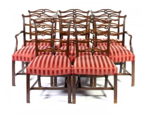 A SET OF EIGHT GEORGE III STYLE MAHOGANY DINING CHAIRS, C1930 including a pair of elbow chairs, 95cm h ++Of the same provenan