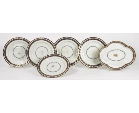 A SET OF SIX DERBY FLUTED BLUE AND GILT PLATES AND A LOBED OVAL DESSERT DISH EN SUITE, PLATES 21CM DIAM, PUCE PAINTED MARK, C