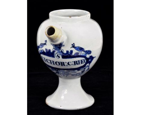 A DELFTWARE SPOUTED DRUG JAR, PAINTED IN COBALT WITH A BANNER INSCRIBED S CICHOR; C; RHEO, 20CM H, 18TH CENTURY (SPOUT RESTOR