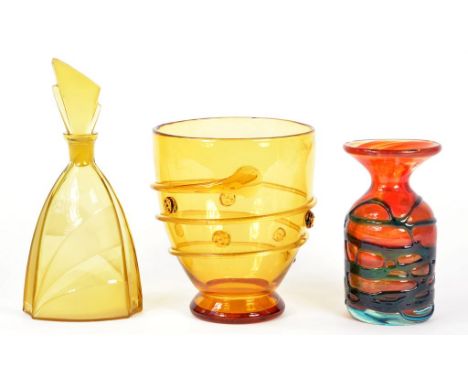 AN AMBER GLASS SPIRAL TRAILED VASE, APPLIED WITH PRUNTS, 17CM H, A 1930'S AMBER GLASS PARTLY FROSTED DECANTER AND STOPPER AND