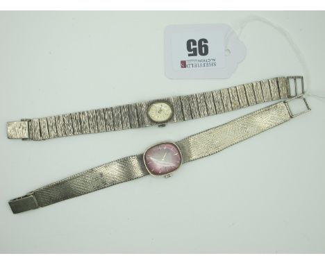 Rotary; A Hallmarked Silver Cased Ladies Wristwatch, the oval dial with line markers, to integral textured bracelet; Together