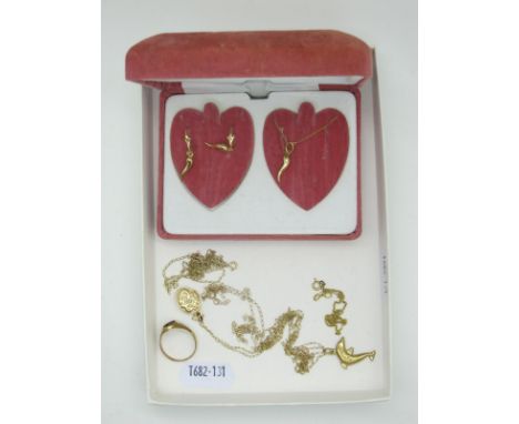 Assorted "375" and Other Fine Chains, a bracelet, dolphin pendant, small locket, horn of plenty pendant on chain, with matchi