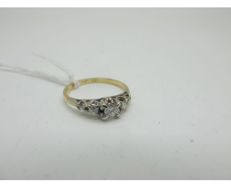 A Dainty Five Stone Diamond Ring, the graduated brilliant cut stones claw set, stamped "18C" "PLA" (finger size L) (2.2grams)