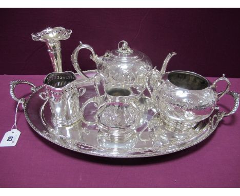 A Decorative Plated Three Piece Tea Set, allover foliate decorated; together with an oval twin handled plated tray, overall w