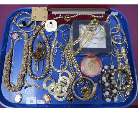 A Mixed Lot of Assorted Gilt Coloured Costume Jewellery, including diamanté bangles, chain style bracelets, modern circular n
