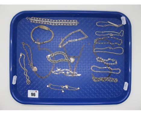 925 and Other Bracelets, including belcher link bracelet with inset highlights, suspending heart pendant; an identity bracele
