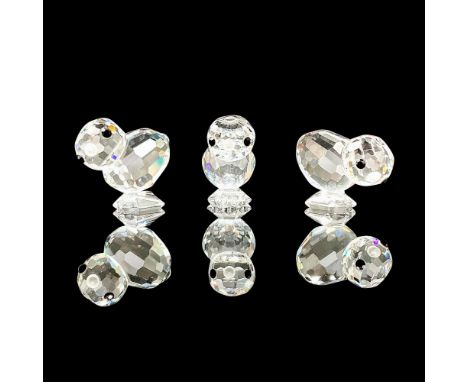 Set of three adorable faceted miniature crystal figurines modeled as tiny chicks. Swarovski acid marks. Each chick measures a