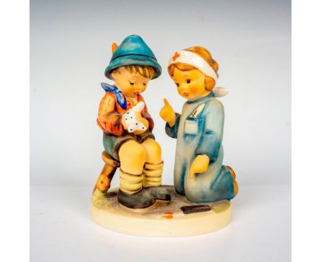 Hand painted in matte finish featuring a young boy with a bandage on his hand getting treatment from a young nurse. M. I. Hum