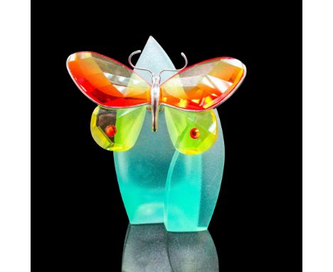 Has .925 sterling silver metal body and antennae, mounted on green frosted leaf stand. This item has its original box: 4.25"L