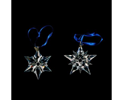 Lead clear crystals limited edition that are part of the Christmas ornaments collection. They hang on blue satin ribbons, wit