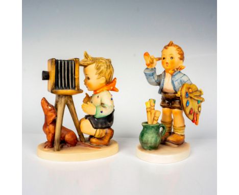 Hand painted in matte finish modeled as young boys, one painting and other is taking a photo. M. I. Hummel impressed backstam