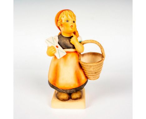 Hand painted in matte finish modeled as a young girl carrying a basket with a letter in hand. M. I. Hummel impressed backstam