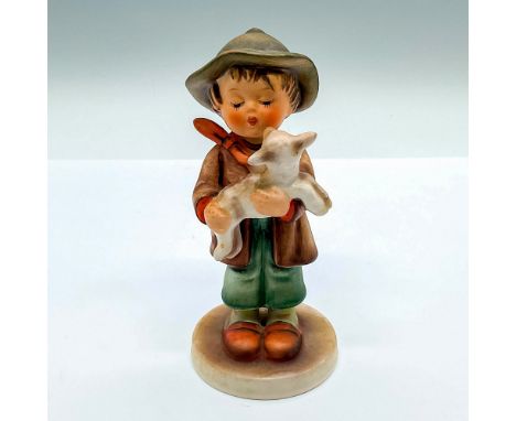 Hand painted figure of a young boy holding a lamb. Goebel Hummel backstamp. Issued: c. 1960-1972Dimensions: 2.5"L x 2.5"W x 5