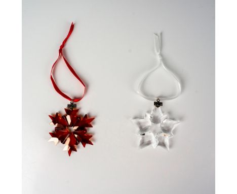 Lead ruby red and clear colored crystals that are part of the Christmas Ornaments collection. They hang on red and white sati