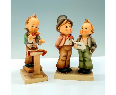 A pair of porcelain figures, Band Leader (1972-1979) depicts a boy conducting with his music book, Duet Boys (1979-1999) depi