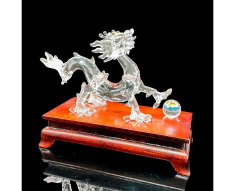 Part of the Fables and Tales collection. Lead crystal dragon made from faceted clear crystal with frosted crystal details and