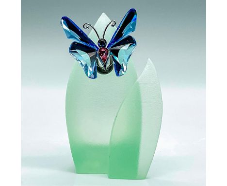 Brilliant blue and pink crystal butterfly attached to a green resin leaf. Butterfly is magnetized and can be removed. Item 71