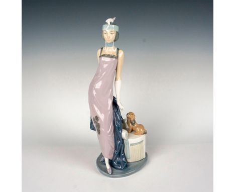 Glazed figure of a 1920 lady with a dog. Lladro backstamp. This item has its original box: 15.75"L x 6.5"W x 6.5"H. Artist: V