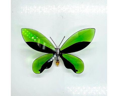 Stunning deep green and amber crystal butterfly with rhodium accents. Butterfly is magnetized on the back. Item 622739. Swaro