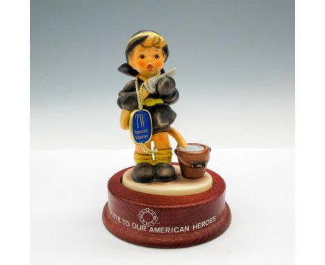 Child figural dressed in rescue attire. Hummel Goebel tag - Temporarily Withdrawn. Limited Edition 1774 of 7500. Goebel backs
