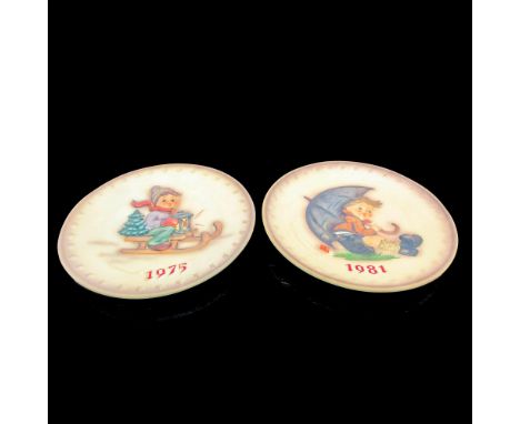 Hand painted 1975 and 1981 Annual plate. Imprint M.J. Hummel on front. Goebel Hummel backstamp. Issued: 1975, 1981Dimensions: