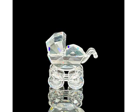 Part of the 'When We Were Young' series. A clear faceted crystal baby stroller. Swarovski marking. This item has its original