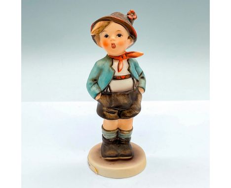 Hand painted figure of a young boy. Goebel Hummel backstamp. Issued: c. 1979-1990Dimensions: 2.25"L x 2.25"W x 5.75"HManufact