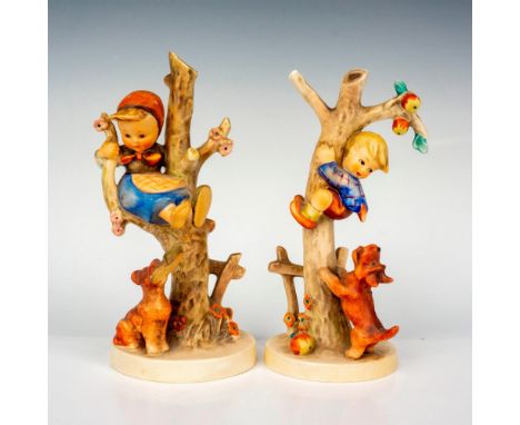 Hand painted in matte finish modeled as a young boy and young girl climbing trees. M. I. Hummel impressed backstamp. Goebel b