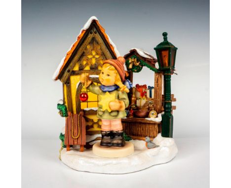 Hand painted in matte finish designed to be displayed atop the musical base entitled Bavarian Christmas Market. M. I. Hummel 