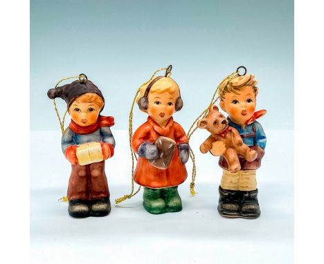 This collection of three porcelain holiday ornaments includes Christmas Gift HUM2074/A/O 1998, Sweet Treats HUM2067/A/O 1998,