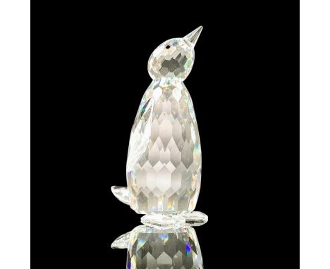 Sparkling faceted and molded crystal figurine modeled as an upright penguin with black eyes. Swarovski acid marks. This item 