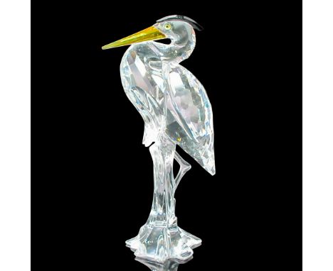 Bird has amber beak and black head feathers. This item has its original box: 7.5"L x 7.5"W x 3.5"H. Dimensions: 2.75"L x 2"W 