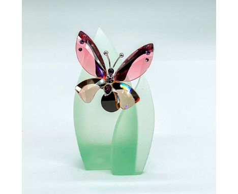 Stunning pale pink, peach and purple crystal butterfly attached to a green resin leaf. Butterfly is magnetized and can be rem