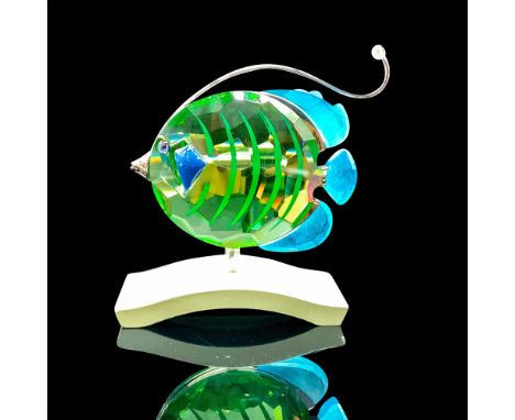 Depicts a green crystal tropical fish with light blue accents and a silver coated mouth and antenna. Swarovski backstamp. Thi