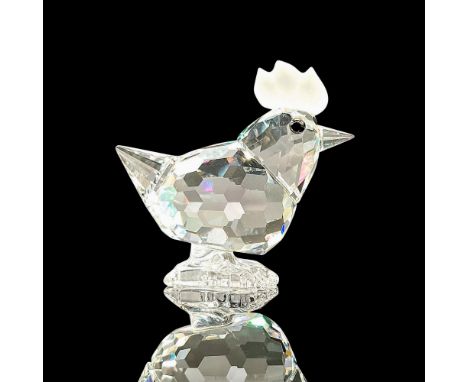 Sparkling faceted and molded crystal figurine modeled as an adorable hen with frosted comb detail and black eyes. Swarovski a