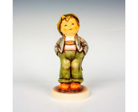 Hand painted in matte finish modeled as a smiling German boy. M. I. Hummel impressed backstamp. Goebel backstamp. Dimensions:
