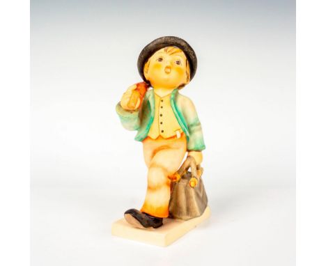 Hand painted in matte finish modeled as a young working boy. M. I. Hummel impressed backstamp. Goebel backstamp. Dimensions: 