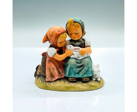Hand painted figure of two young girls with two white rabbits. Goebel Hummel backstamp. Issued: c. 1990-1999Dimensions: 4.25"