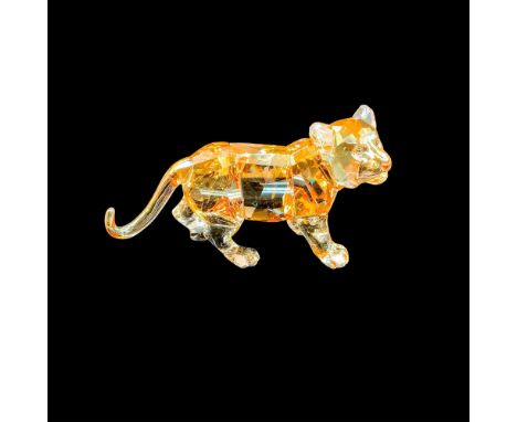 Shimmers in fully facetted golden shine crystal with satin crystal stripes. Item comes with original box measuring 5"L x 5"W 
