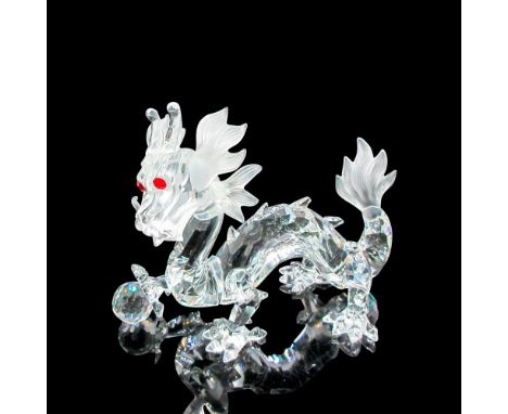 Dragon has clear body, frosted tail and whiskers, red faceted eyes and is holding a crystal ball. This item has its original 