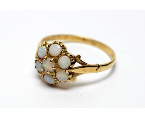An opal cluster ring, on 9ct yellow gold shank, ring size R, 2.0g gross. 