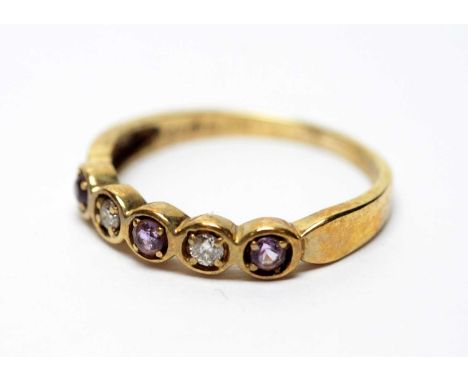 An amethyst and diamond ring, on a 9ct yellow gold shank, ring size O, 1.8g gross. 