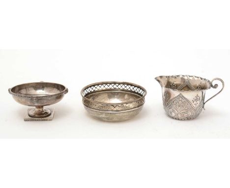 A silver jug, by James Deakin &amp; Sons, Sheffield 1890; a silver dish by William Hutton &amp; Sons Ltd, Chester 1913; and a