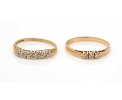 A five stone diamond ring and a three stone diamond ring, each on 9ct yellow gold shanks, 2.9g gross. 