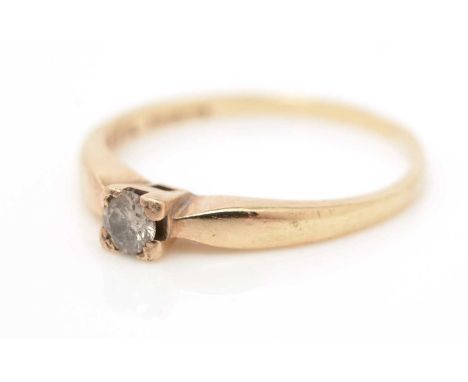 A single stone diamond ring, the brilliant-cut diamond weighing approximately 0.15carats, on 9ct yellow gold shank, ring size