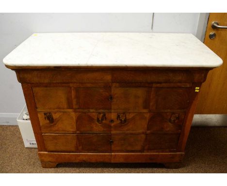 A Continental Biedermeier style marble top washstand, with blind frieze drawer and three further drawers below, on bracket fe